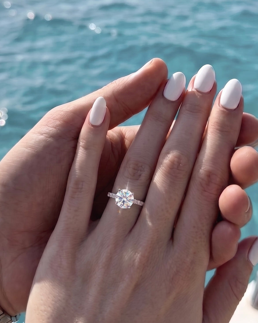 Solitaire with pavé band ring