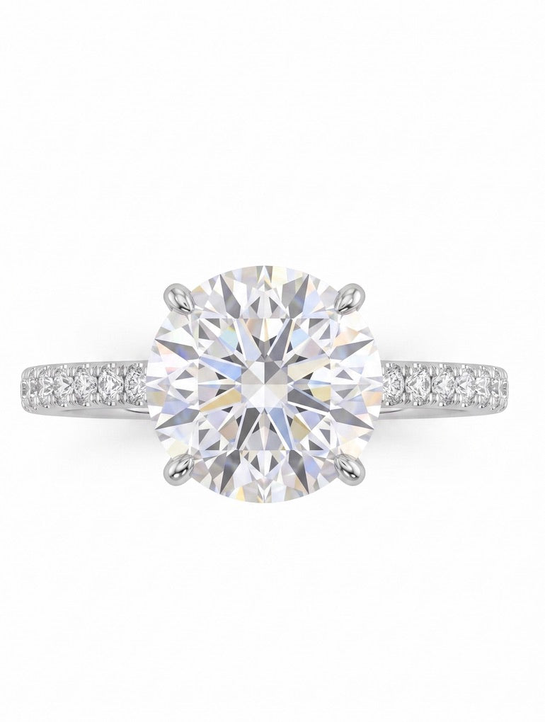 Solitaire with pavé band ring