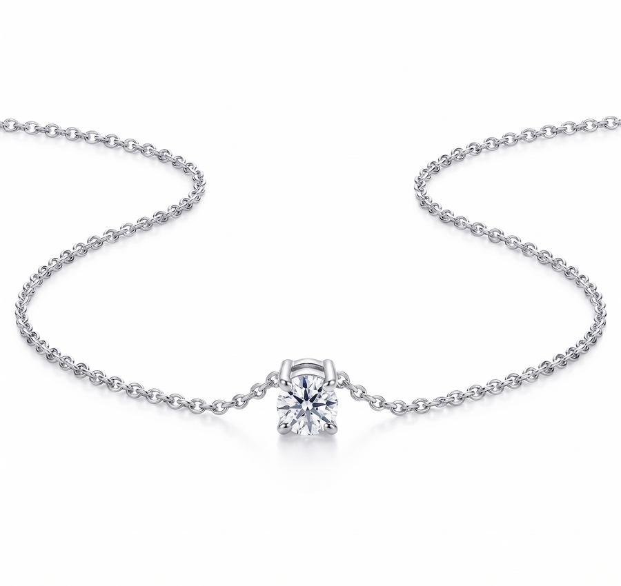 14k gold necklace with a diamond pendant on a white background