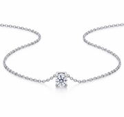 14k gold necklace with a solitaire diamond pendant on a white background
